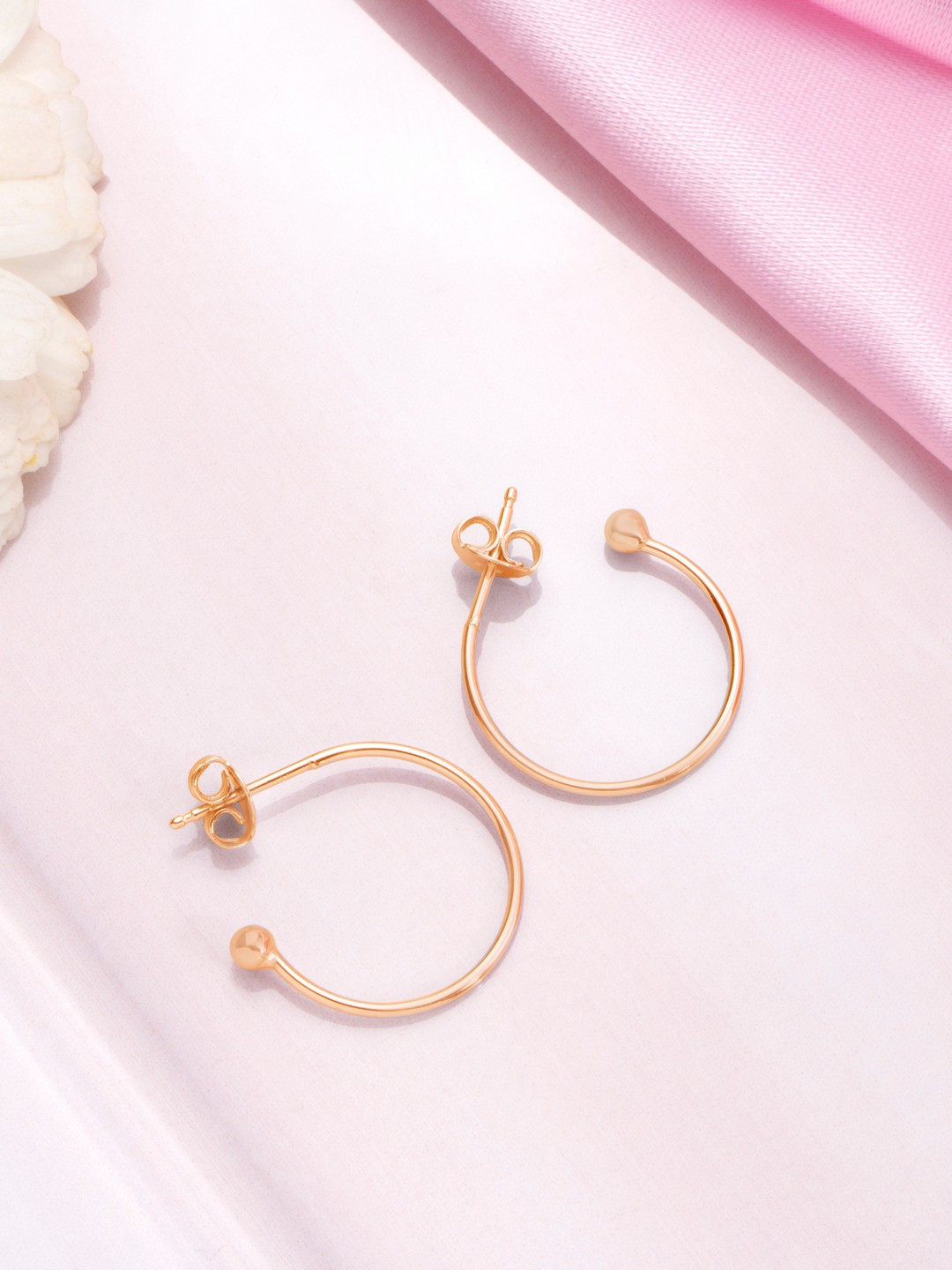 

Zavya Rose Gold Circular Half Hoop Earrings