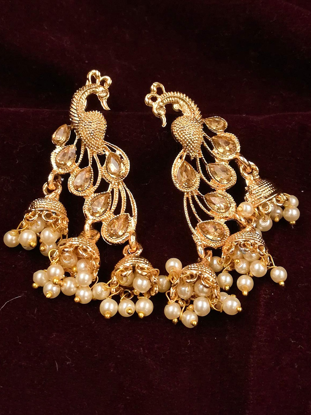 

Saizen Gold-Toned Peacock Shaped Jhumkas Earrings