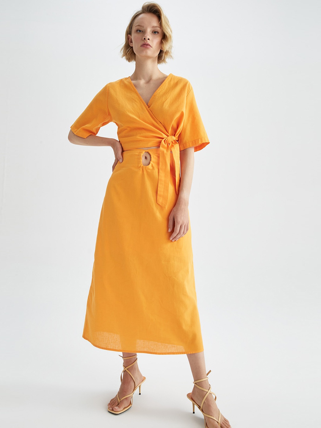 

DeFacto Women Orange Solid A-Line Midi Skirts