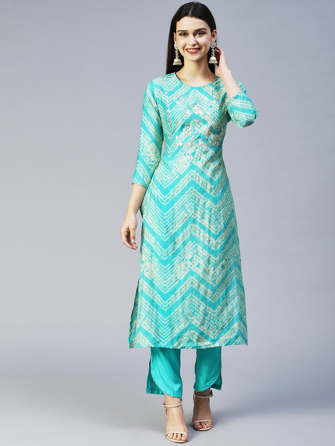 

FASHOR Women Turquoise Blue Printed Kurta With Trousers