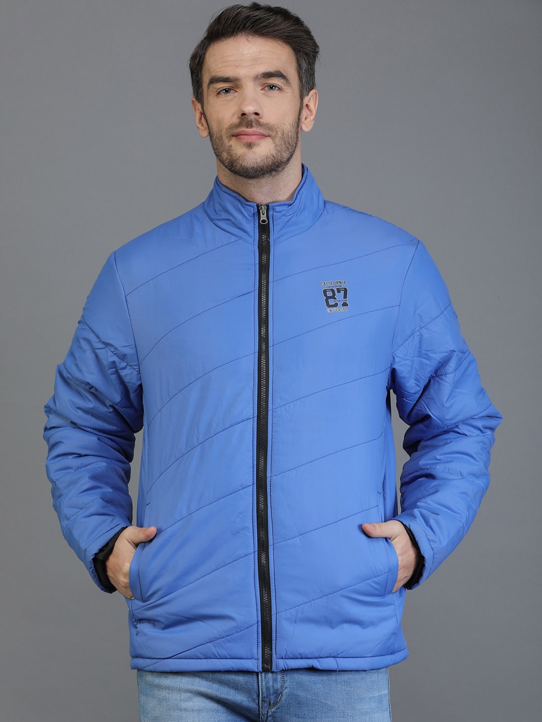 

TQS Men Blue Windcheater and Water Resistant Padded Jacket