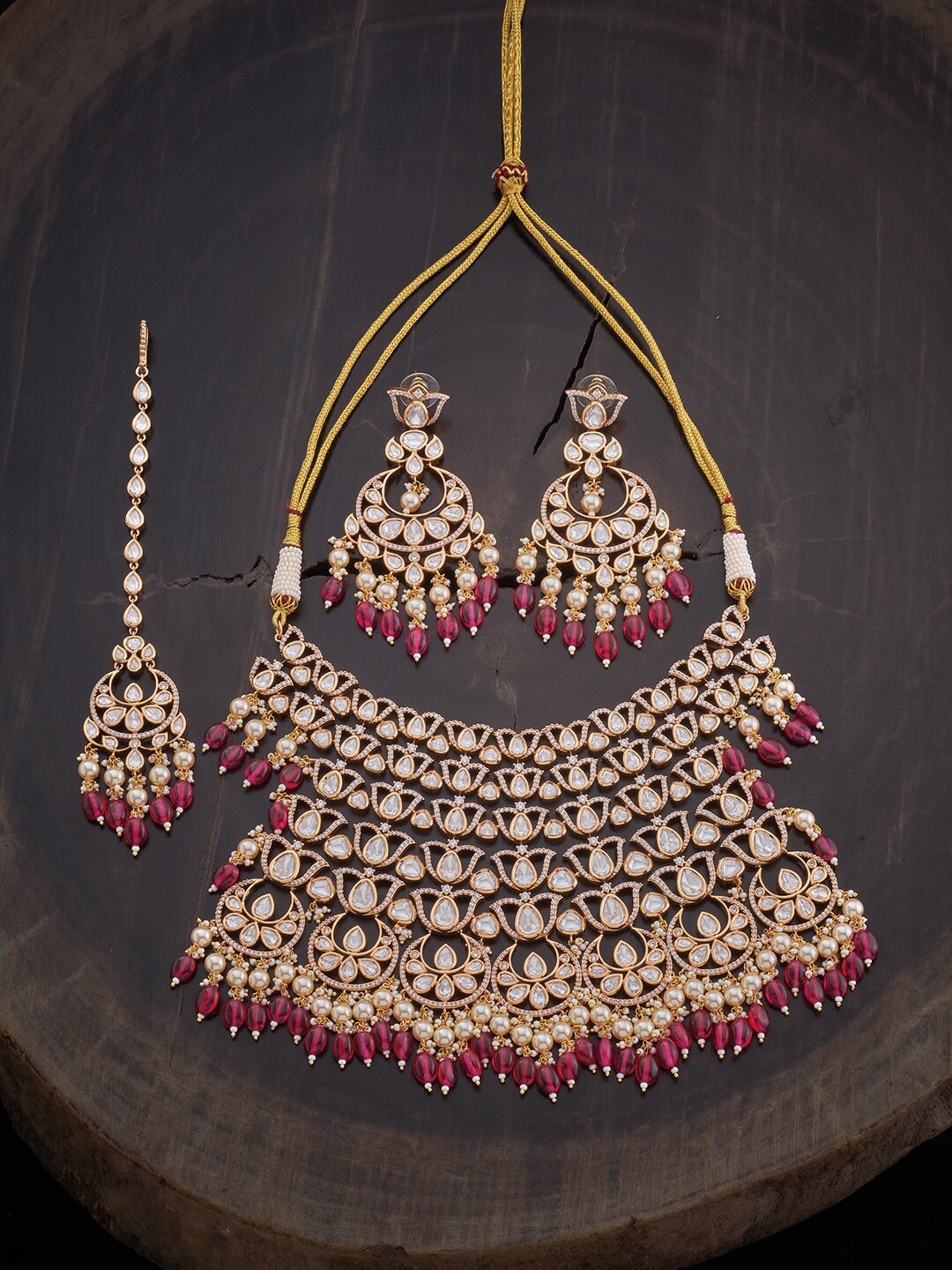 

Kushal's Fashion Jewellery Gold-Toned White & Pink Kundan-Studded & Pearl Beaded Jewellery Set