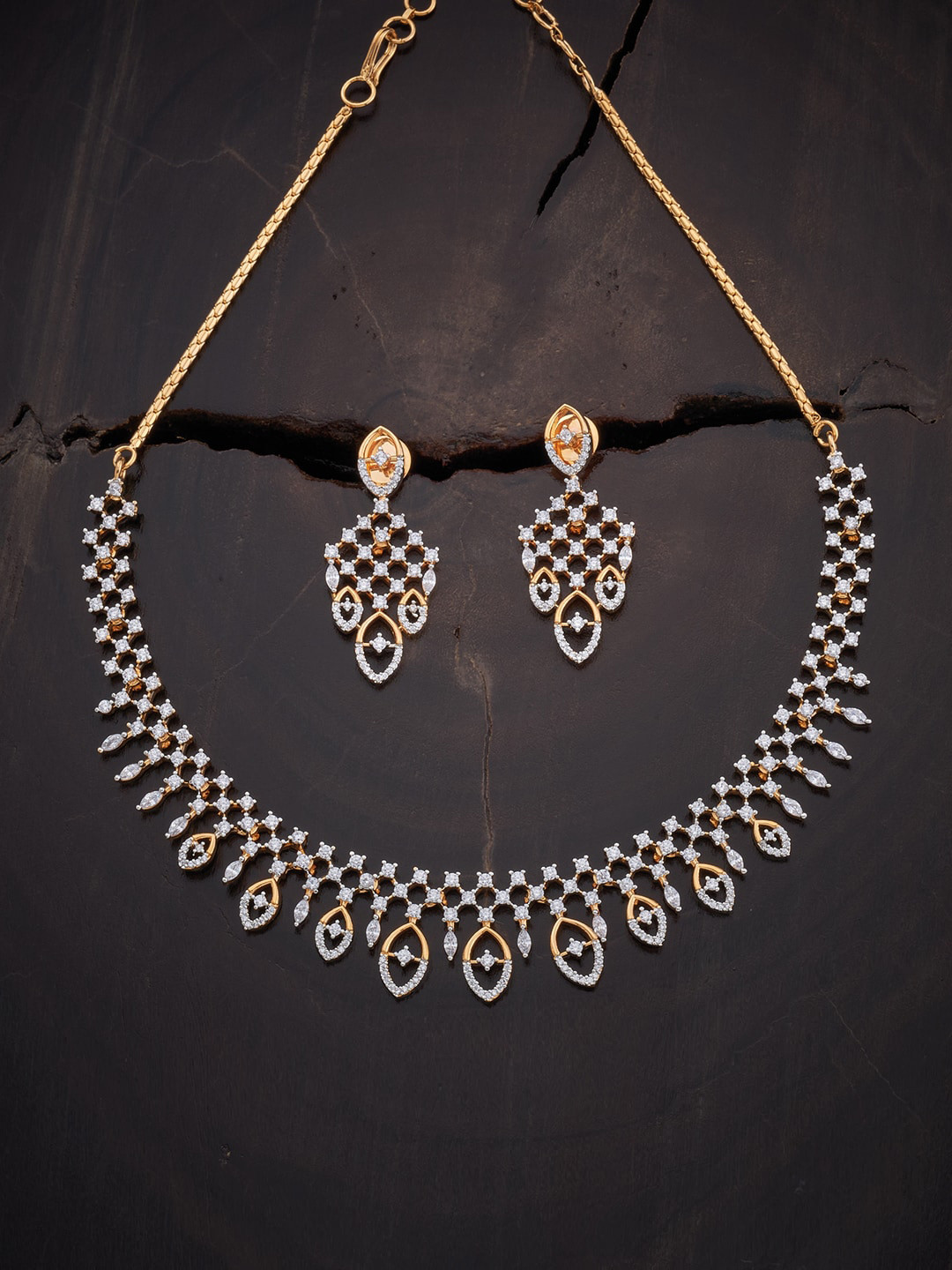 

Kushal's Fashion Jewellery Women Gold-Plated White CZ Studded Jewellery Set