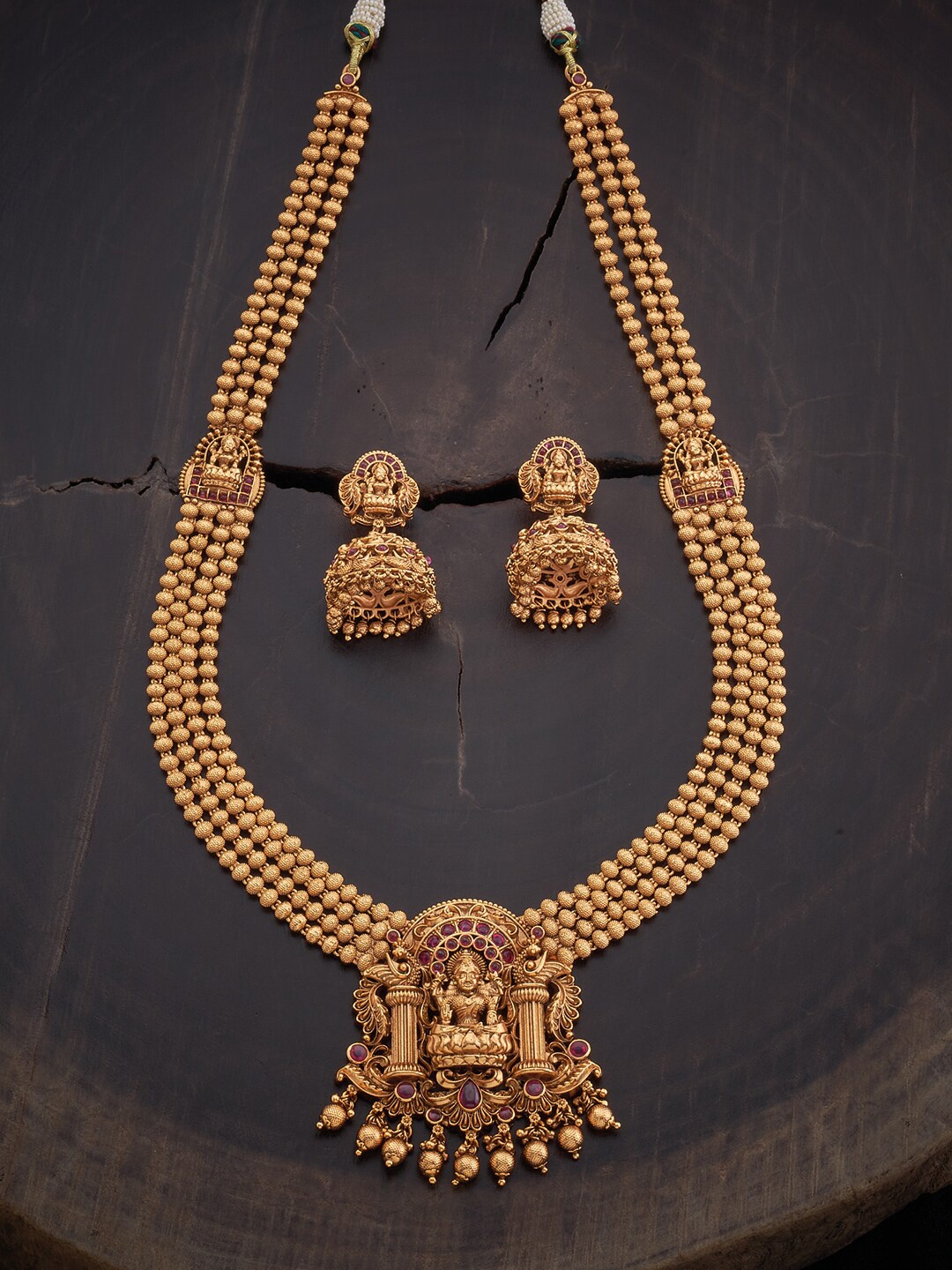 

Kushal's Fashion Jewellery Gold-Toned & Red Stone Studded & Beaded Jewellery Set