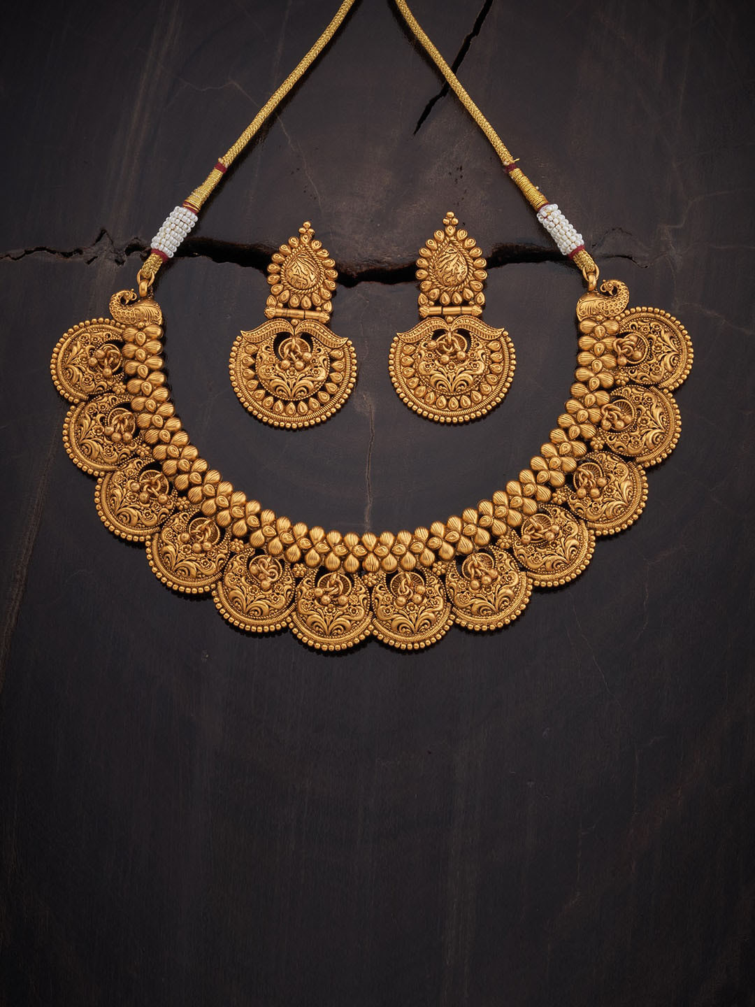 

Kushal's Fashion Jewellery Gold-Toned & Design Carved Jewellery Set