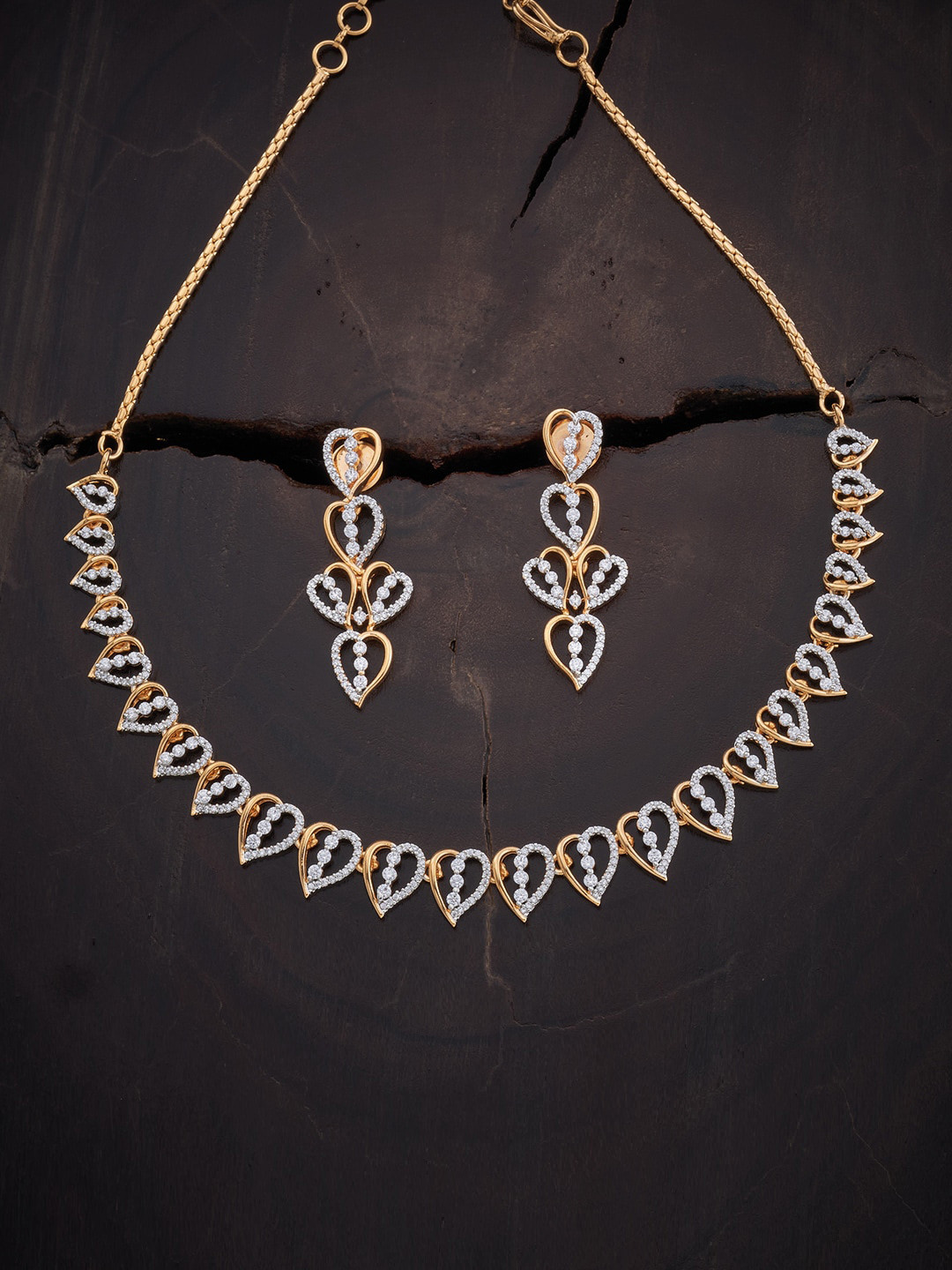 

Kushal's Fashion Jewellery Gold-Plated White Stone-Studded Jewellery Set