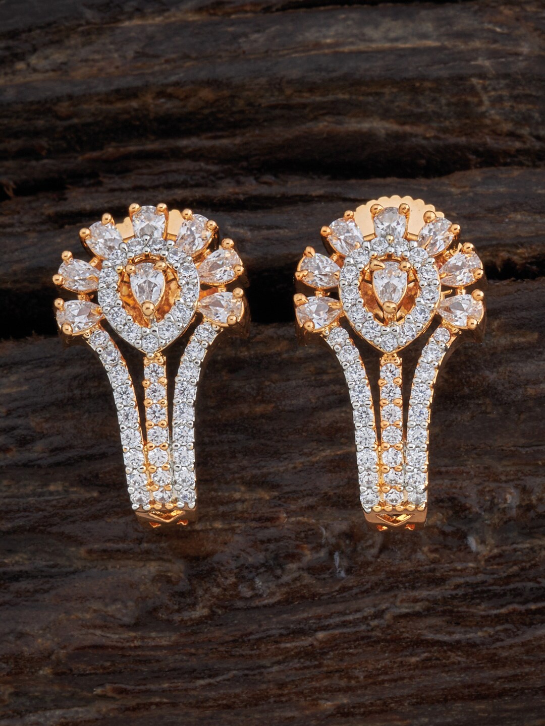 

Kushal's Fashion Jewellery Gold Polish White Floral Studs Earrings