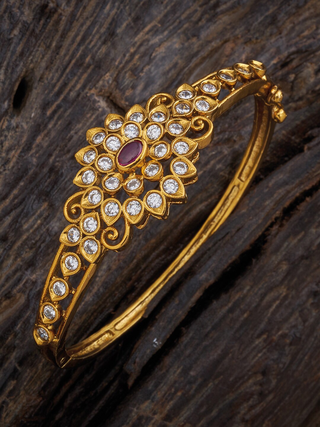 

Kushal's Fashion Jewellery Women Gold-Toned & White Antique Kada Bracelet