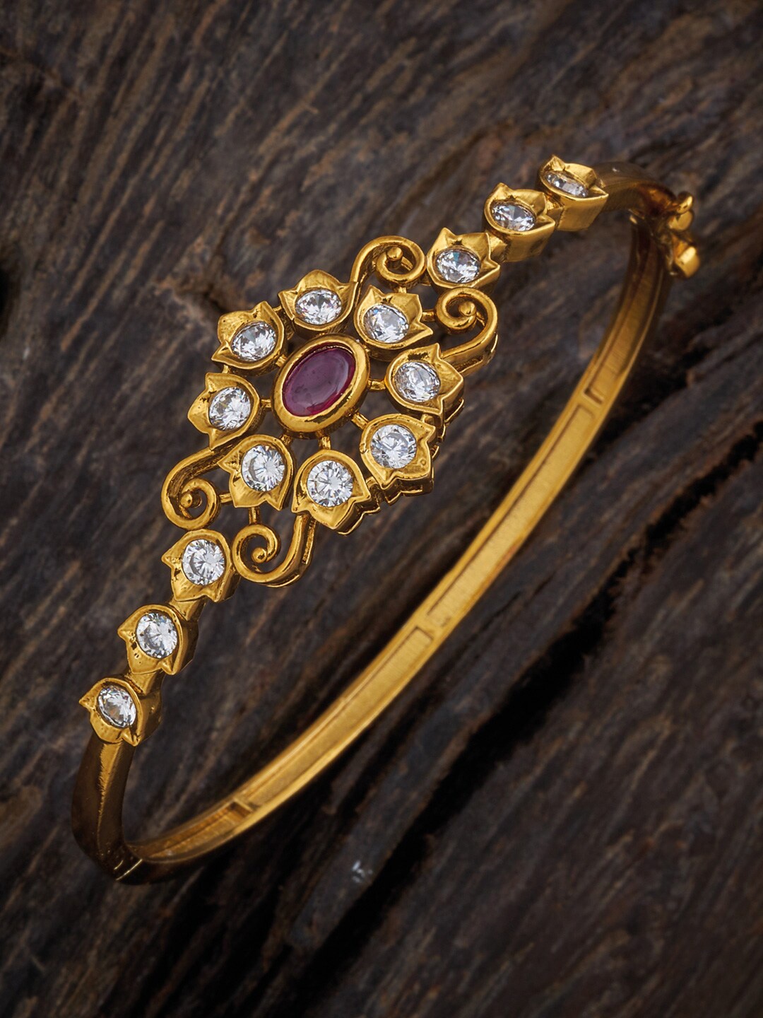 

Kushal's Fashion Jewellery Women Gold-Toned & Pink Antique Kada Bracelet