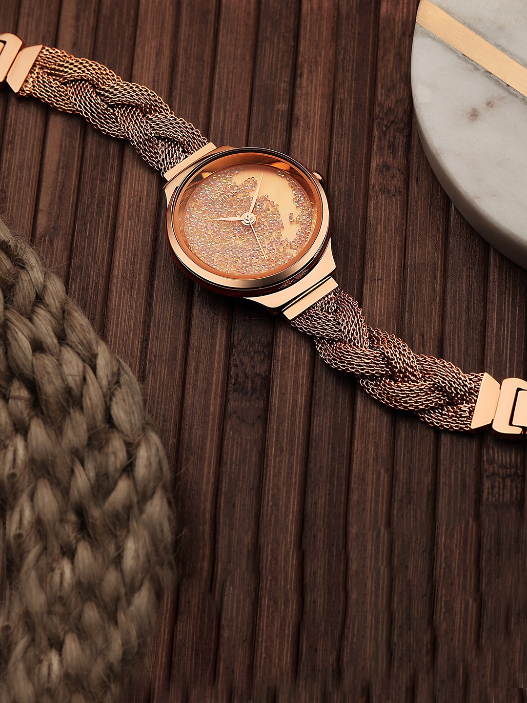 

Titan Women Rose Gold-Toned Embellished Dial & Rose Gold Toned Stainless Steel Bracelet Style Straps Watch 95204WM01