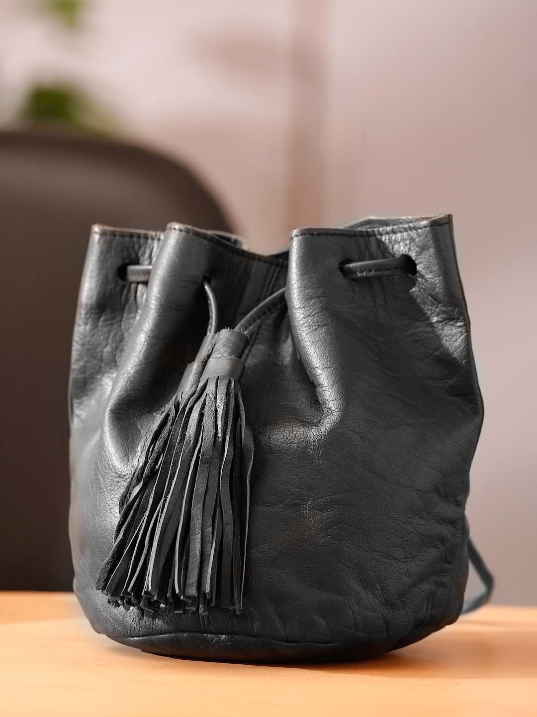 

Suvaska Black Textured Leather Structured Sling Bag with Quilted