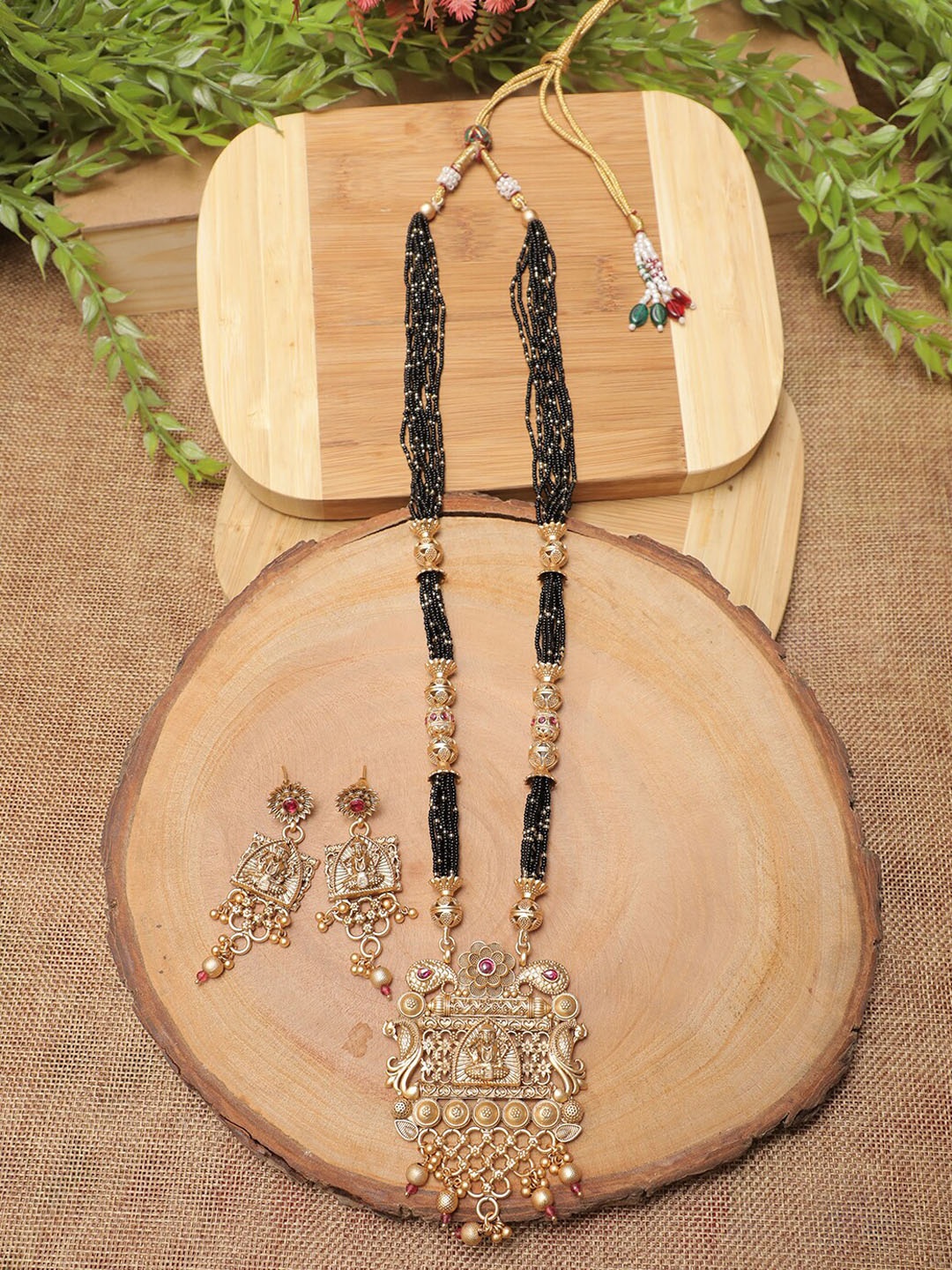 

Swarajshop Gold-Plated Maroon Pearl-Studded Jewellery Set