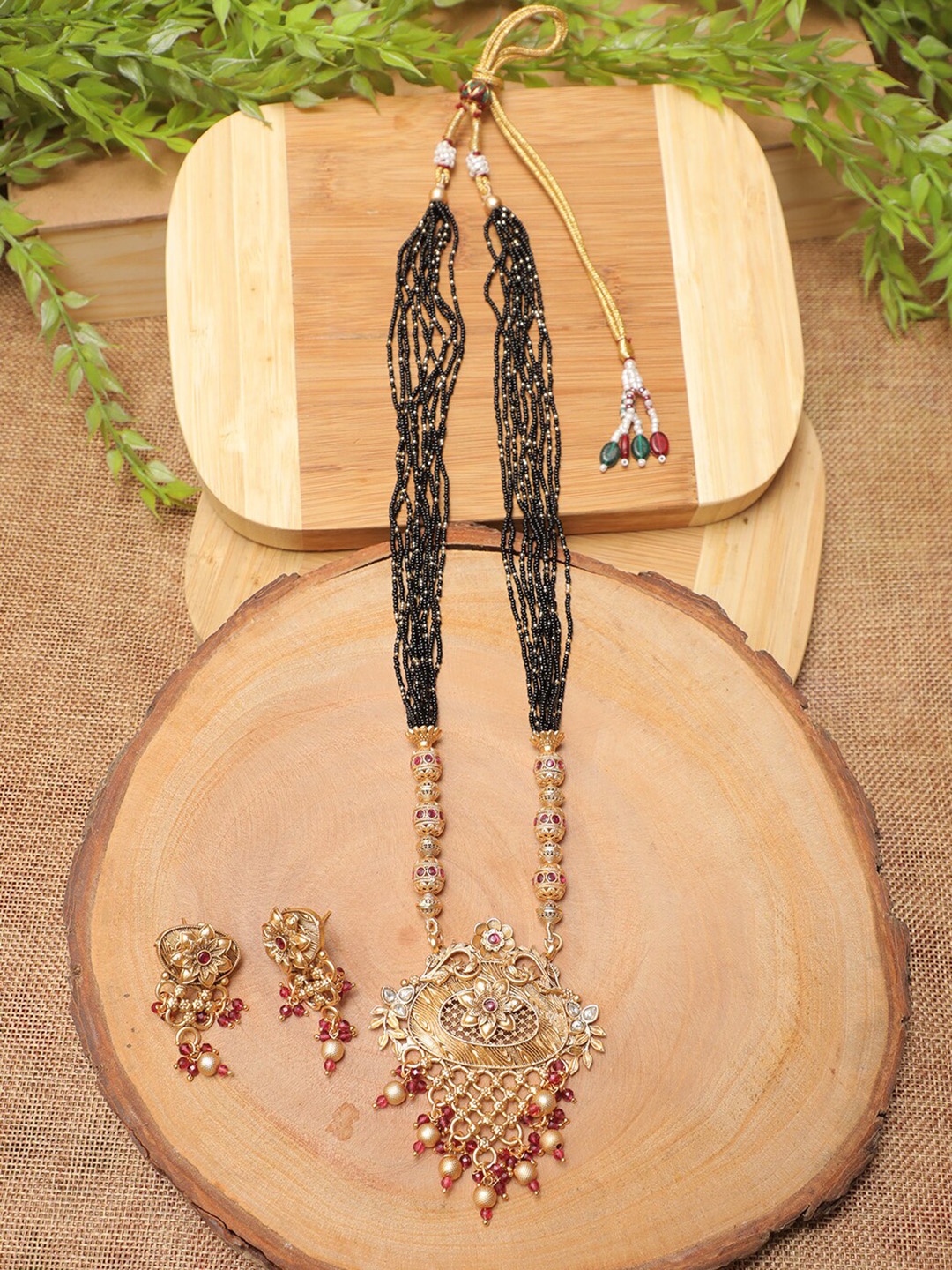 

Swarajshop Black & Maroon Gold-Plated Beaded Jewellery Set