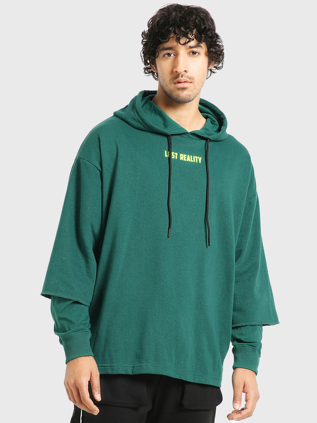 

Bewakoof Men Lost Reality Typography Super Loose Fit Hoodie, Green