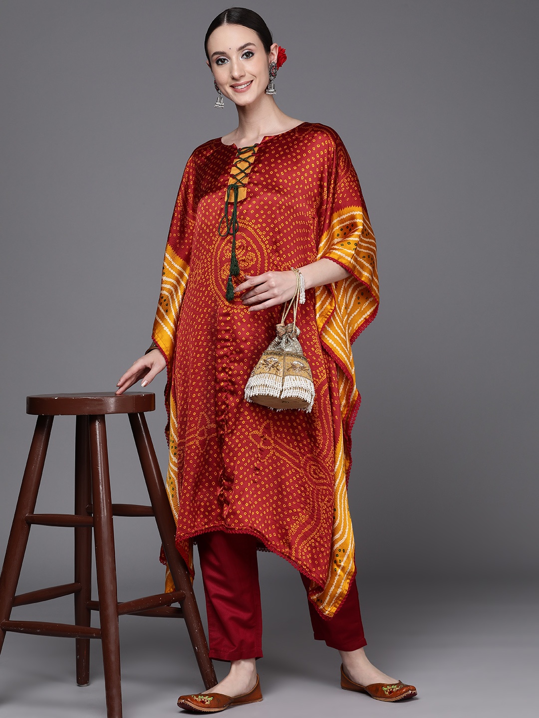 

Indo Era Women Bandhani Printed Extended Sleeves Kaftan Kurta, Rust