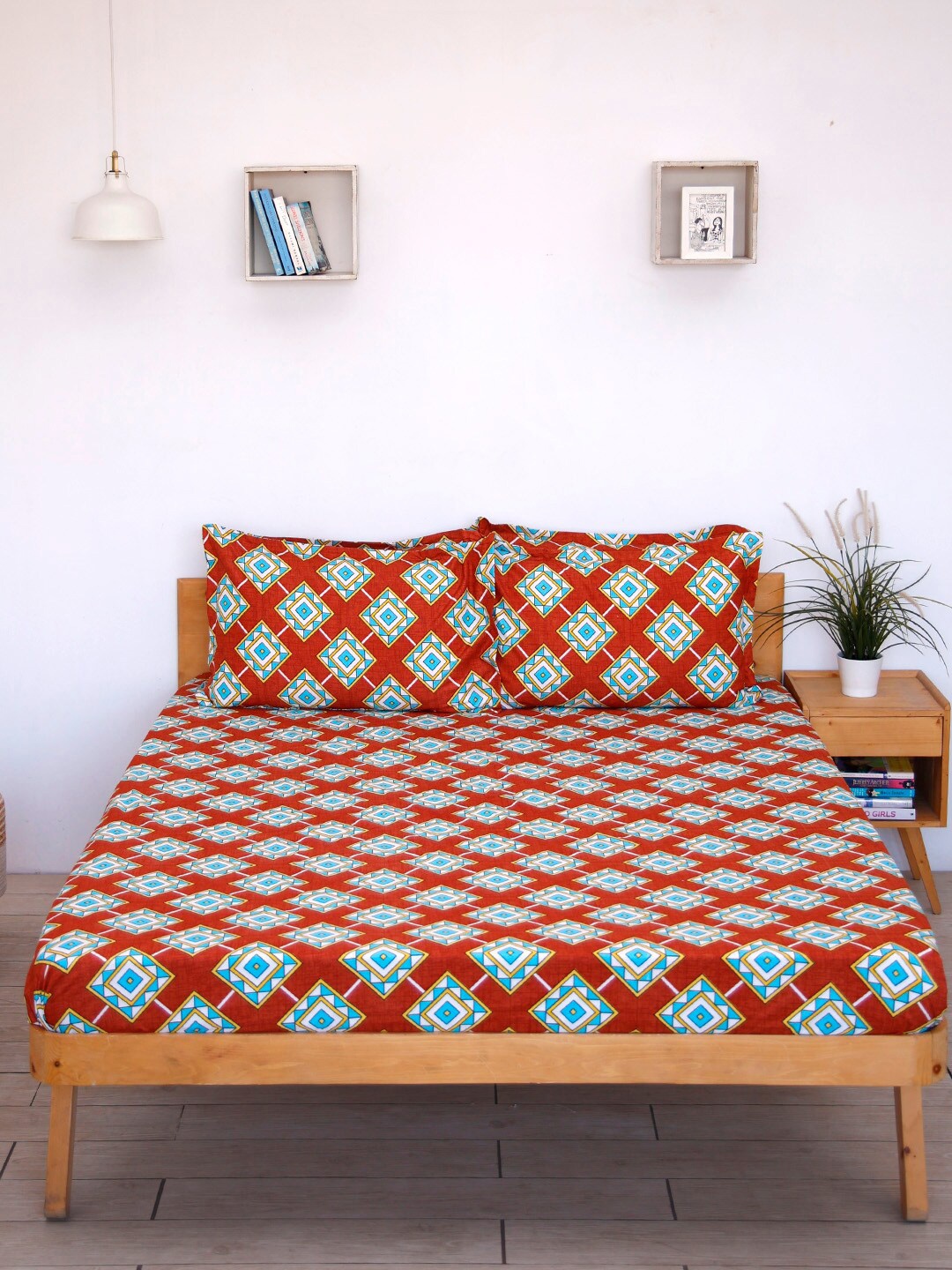 

Ariana Maroon & Blue Geometric 144 TC Queen Bedsheet with 2 Pillow Covers