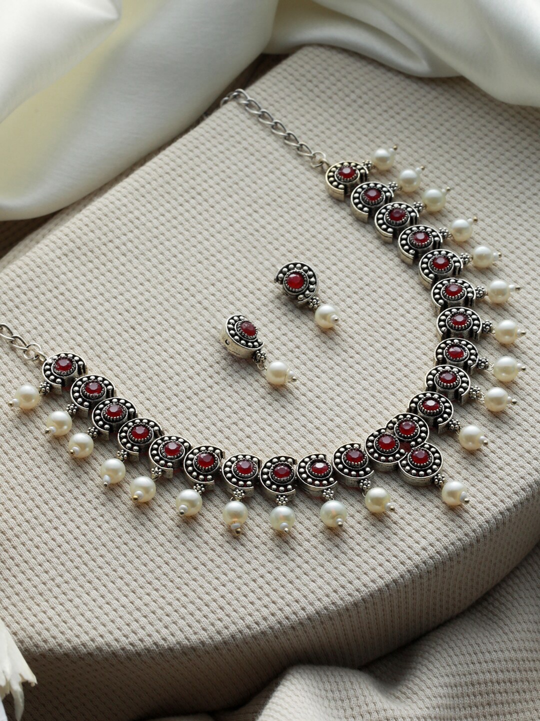 

Priyaasi Oxidised Silver-Plated White & Pink Stone-Studded & Pearl Beaded Jewellery Set