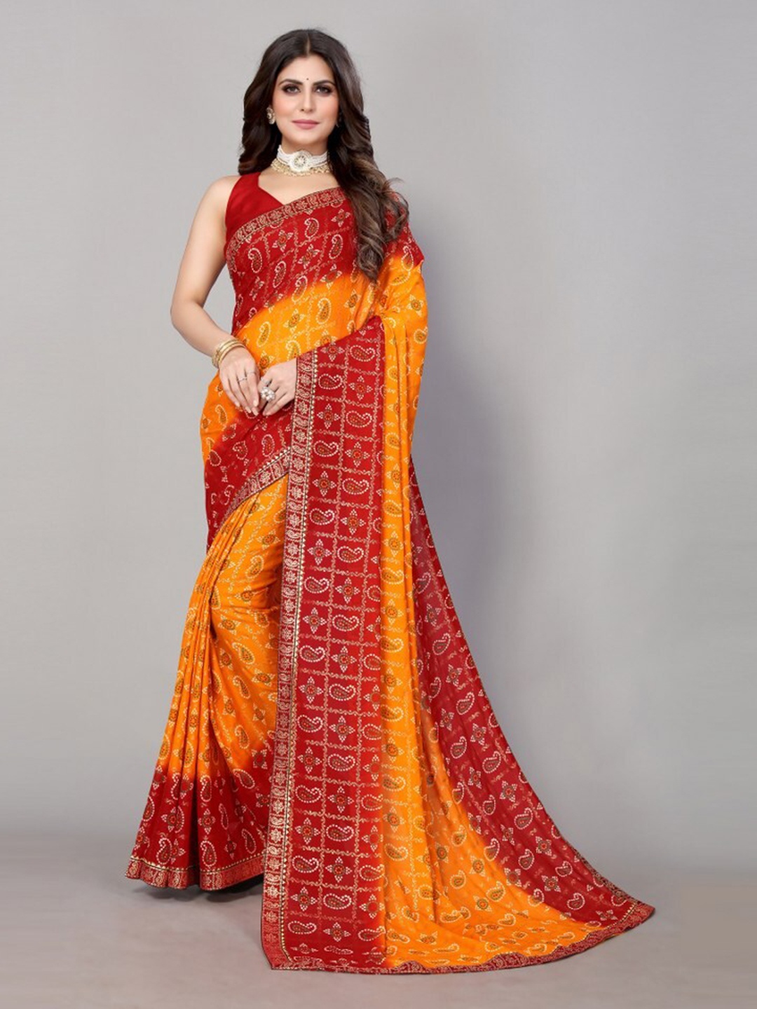 

Yashika Yellow & Red Bandhani Printed Poly Georgette Saree