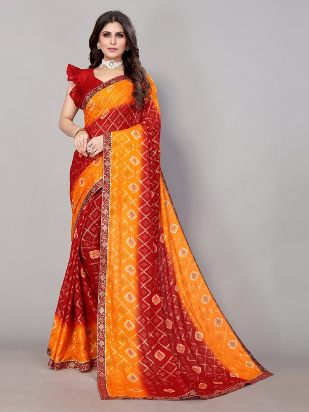 

Yashika Red & Orange Bandhani Printed Gotta Patti Saree