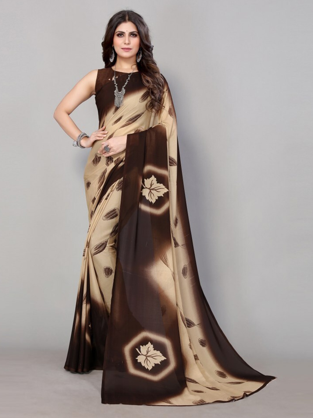 

Yashika Brown & Cream-Coloured Ethnic Motifs Printed Poly Georgette Saree