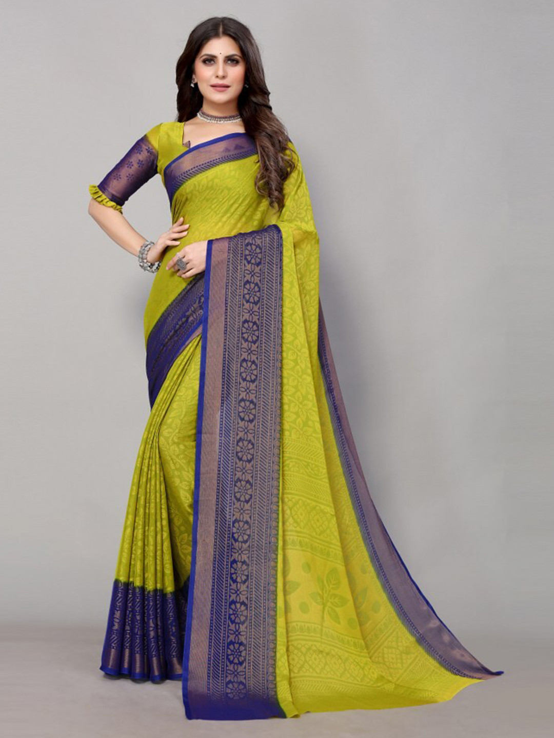

Yashika Navy Blue & Green Floral Printed Zari Poly Chiffon Saree