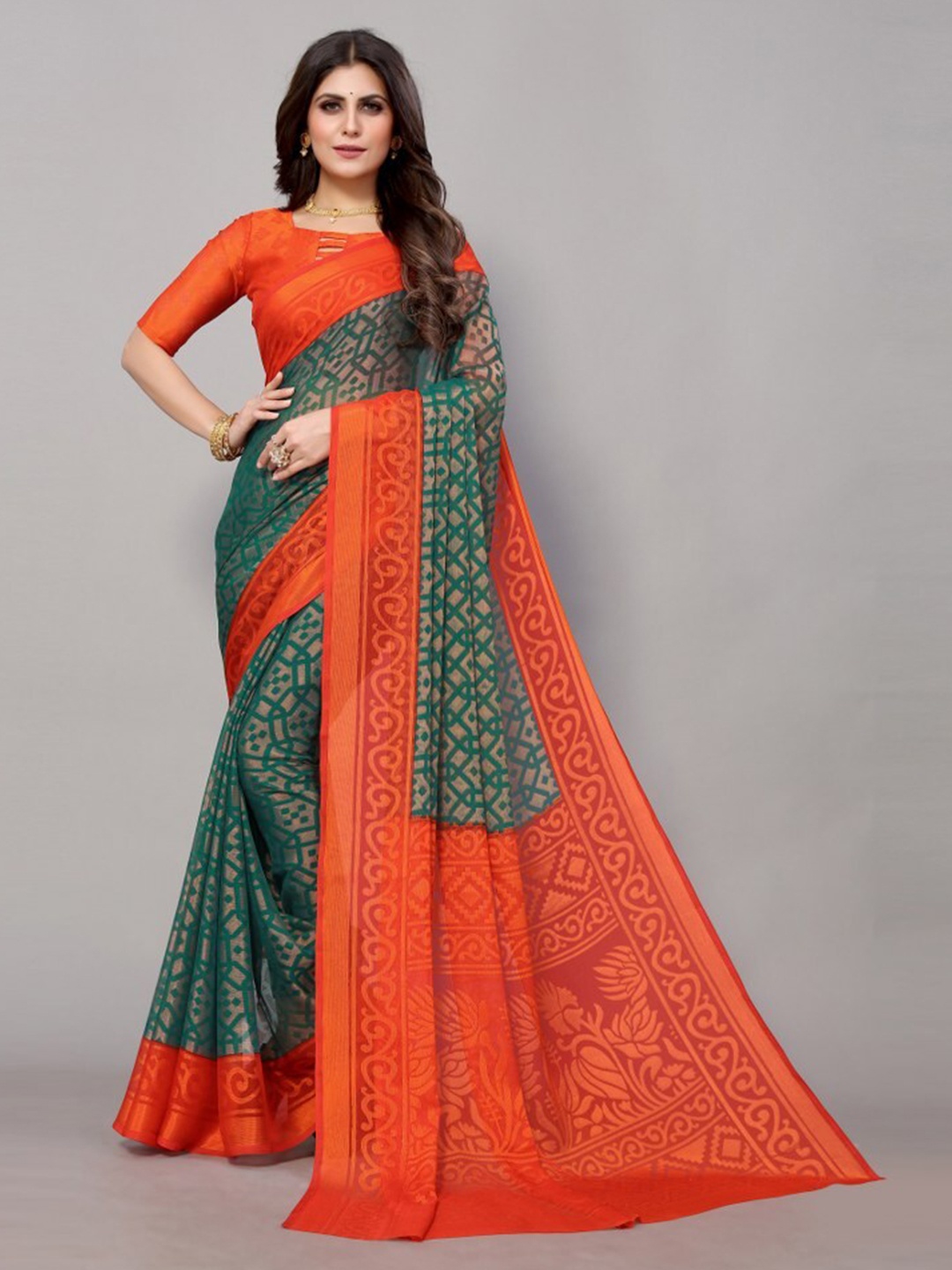 

Yashika Teal & Teal Floral Printed Poly Chiffon Saree