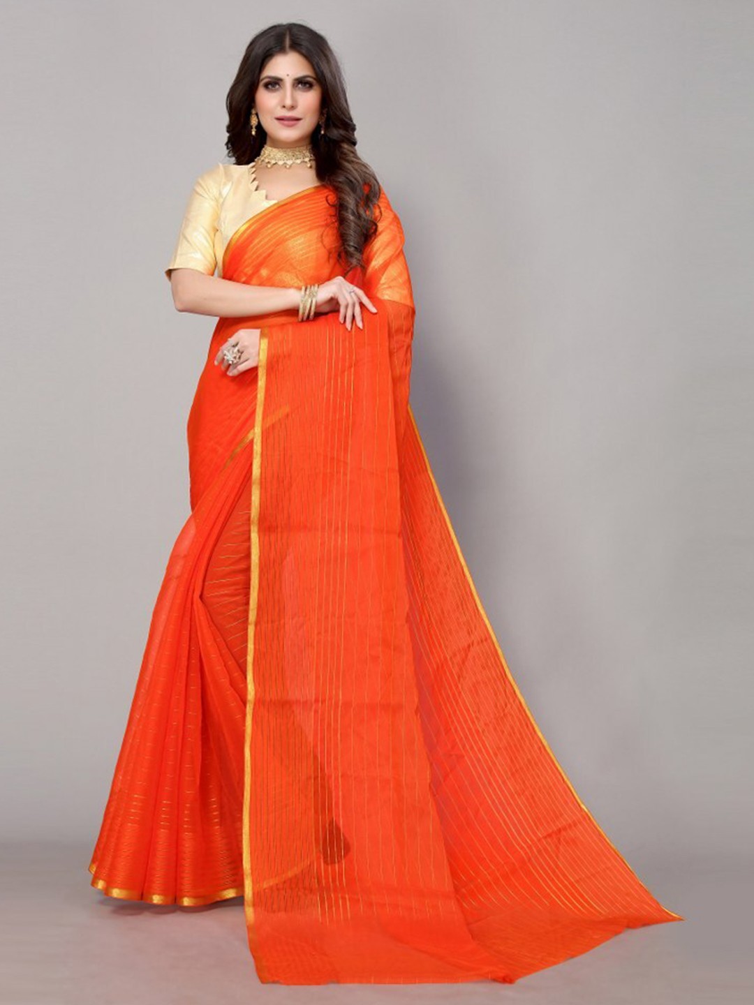 

Yashika Orange & Gold-Toned Striped Zari Poly Chiffon Saree