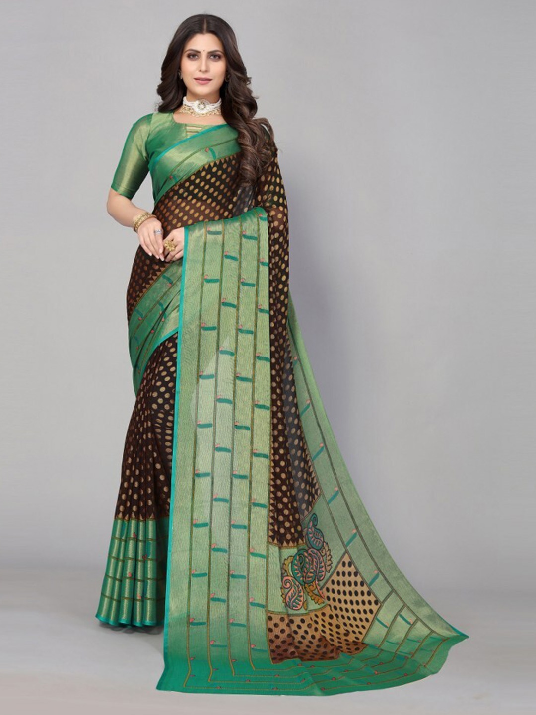 

Yashika Black & Green Printed Poly Chiffon Saree