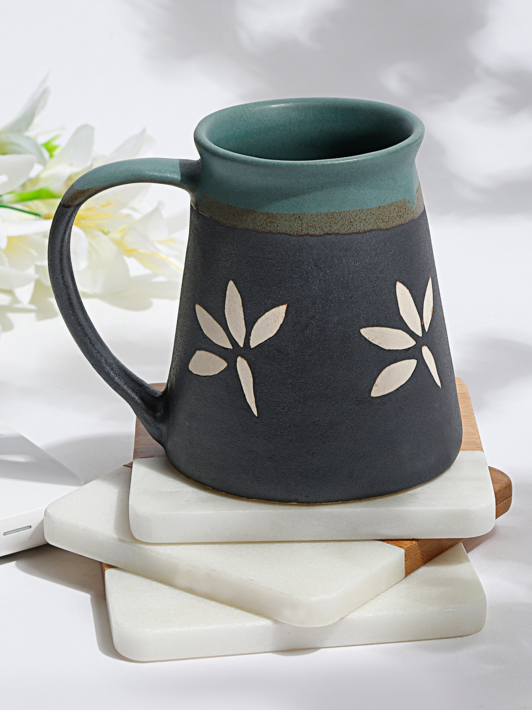 

EK BY EKTA KAPOOR Glazed Ceramics Black & Cream Painted Textured Glossy Mug 300ml