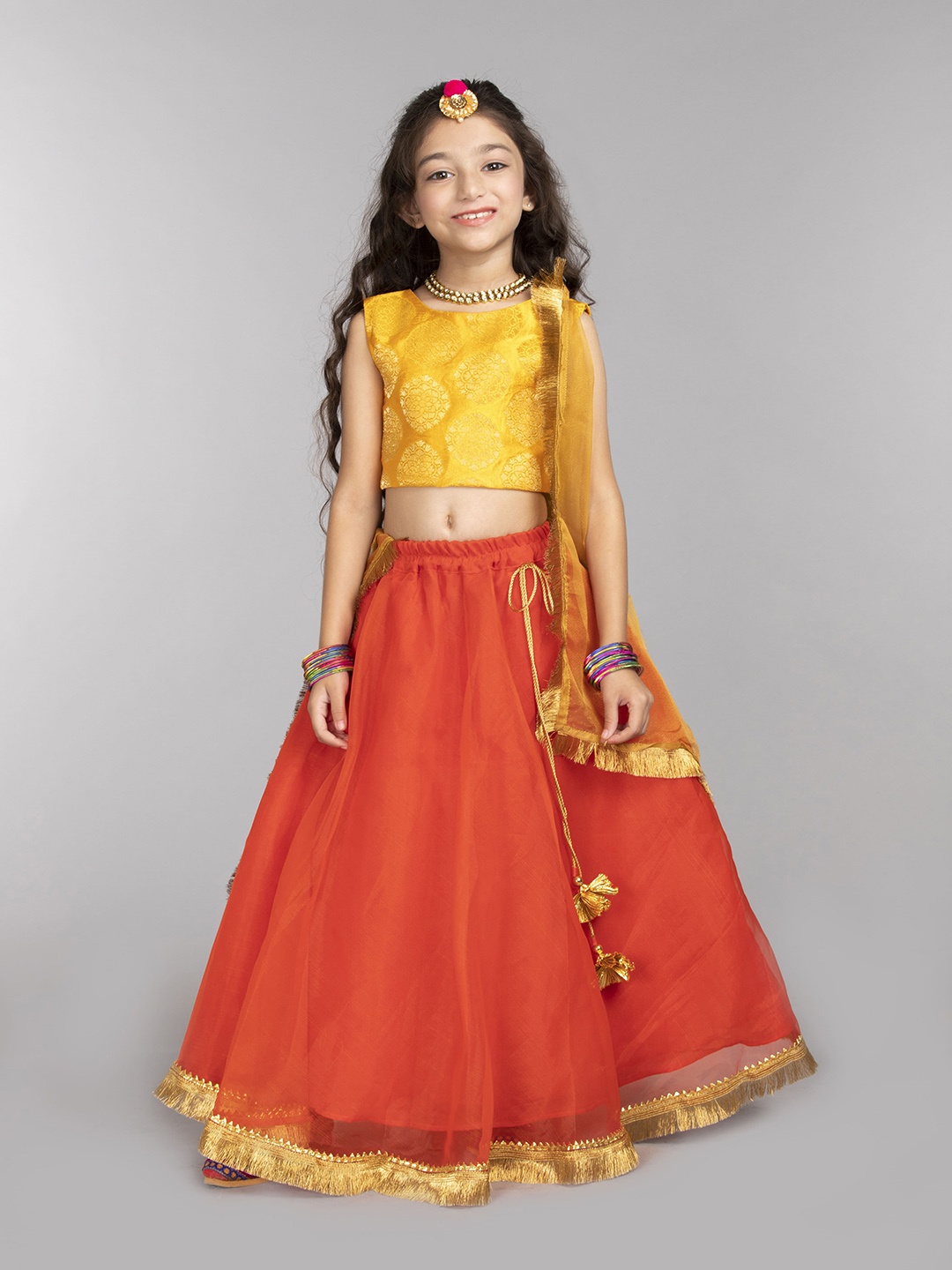 

BYB PREMIUM Girls Orange & Yellow Embellished Lehenga & Blouse With Dupatta