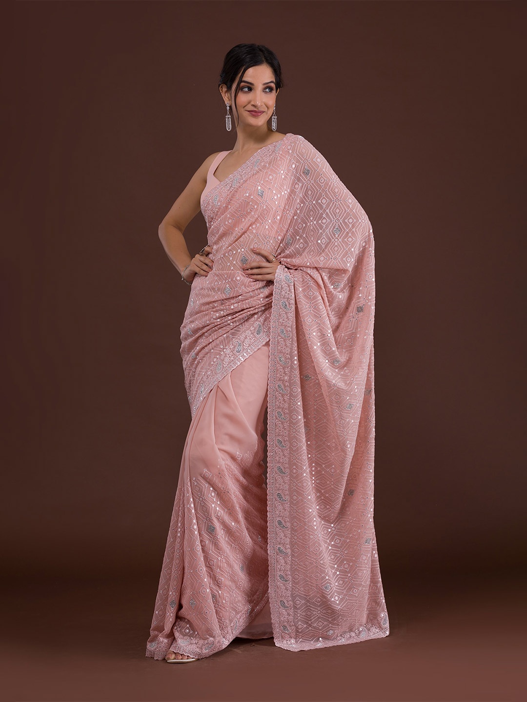 

Koskii Peach-Coloured Ethnic Motifs Embroidered Saree