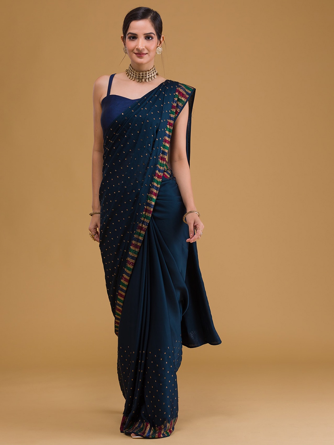 

Koskii Navy Blue & Red Embellished Beads and Stones Saree