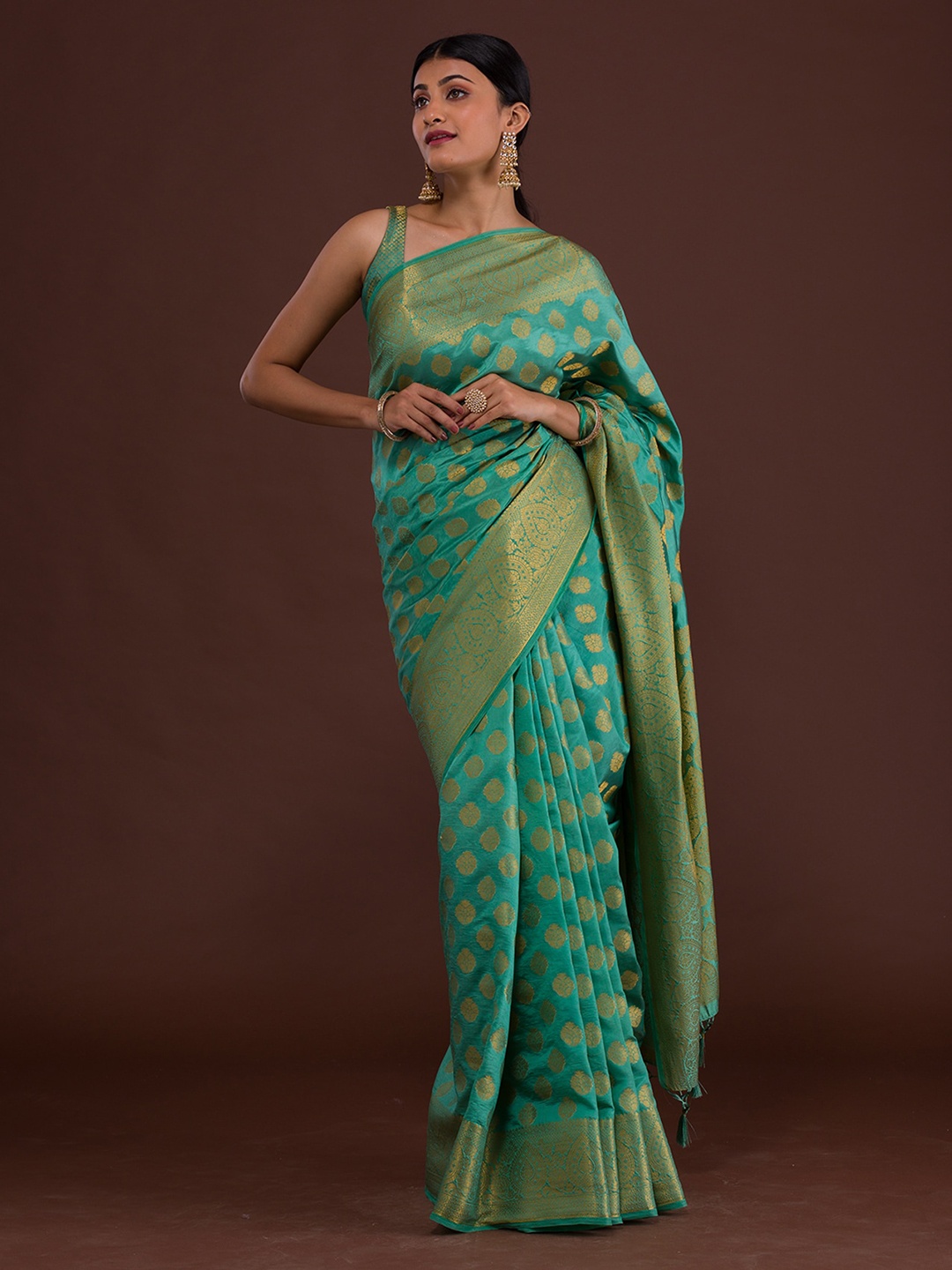 

Koskii Sea Green & Gold-Toned Ethnic Motifs Zari Banarasi Saree