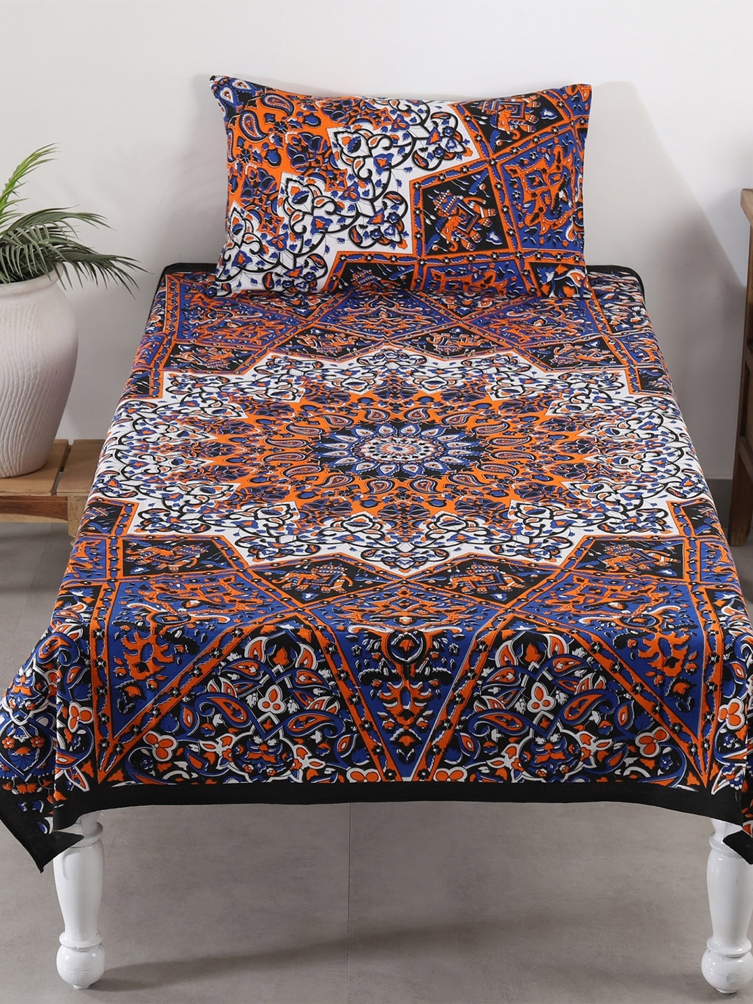 

HANDICRAFT PALACE Navy Blue & Brown Printed 144 TC Single Bedsheet with 1 Pillow Cover