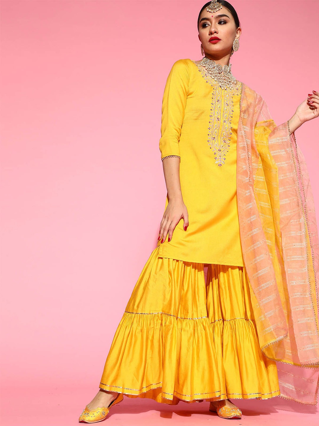 

ODETTE Women Yellow Floral Embroidered Kurta with Sharara & With Dupatta