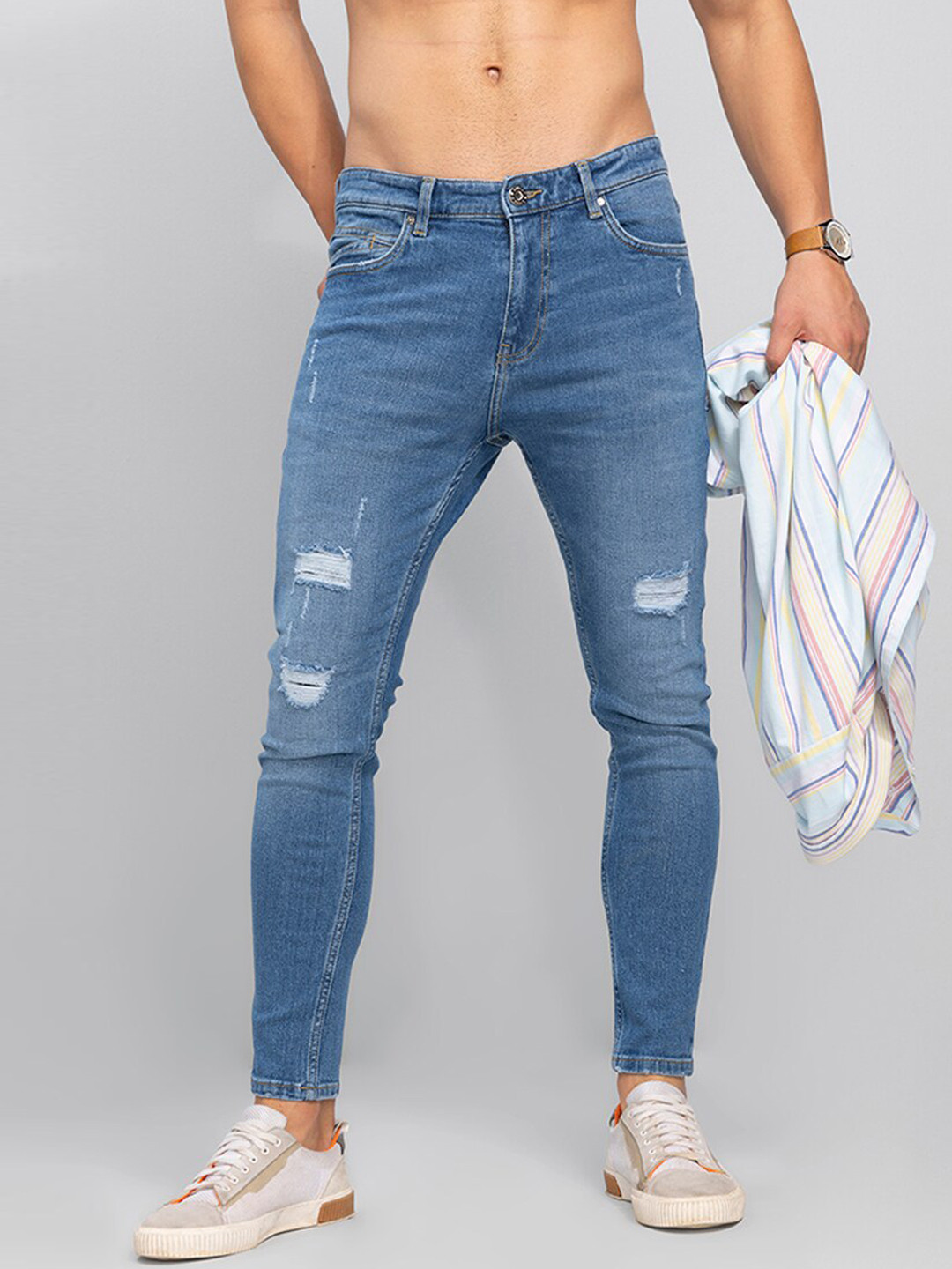

Snitch Men Blue Skinny Fit Mildly Distressed Light Fade Mid Rise Stretchable Jeans