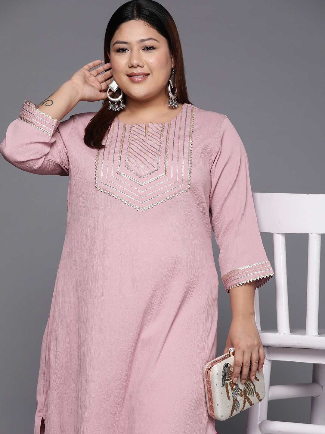 

Varanga Xtra Yoke Design Gotta Patti Crepe Kurta, Mauve