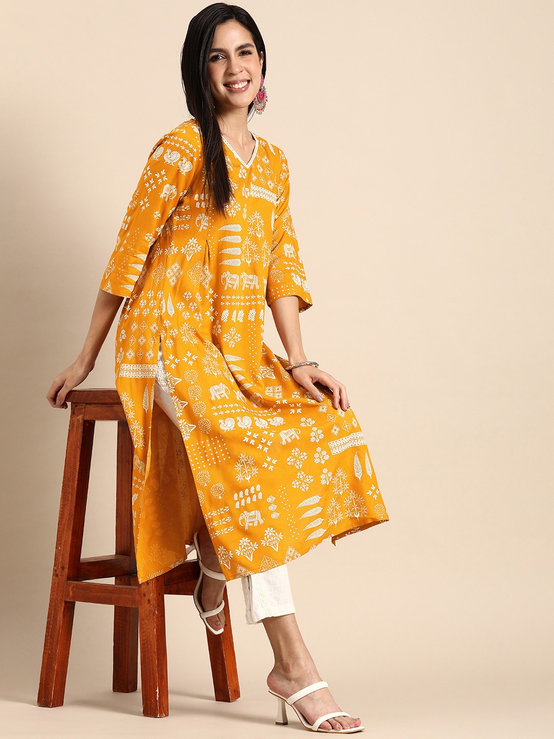 

Anouk Women Ethnic Motifs Printed V-Neck Kurta, Mustard