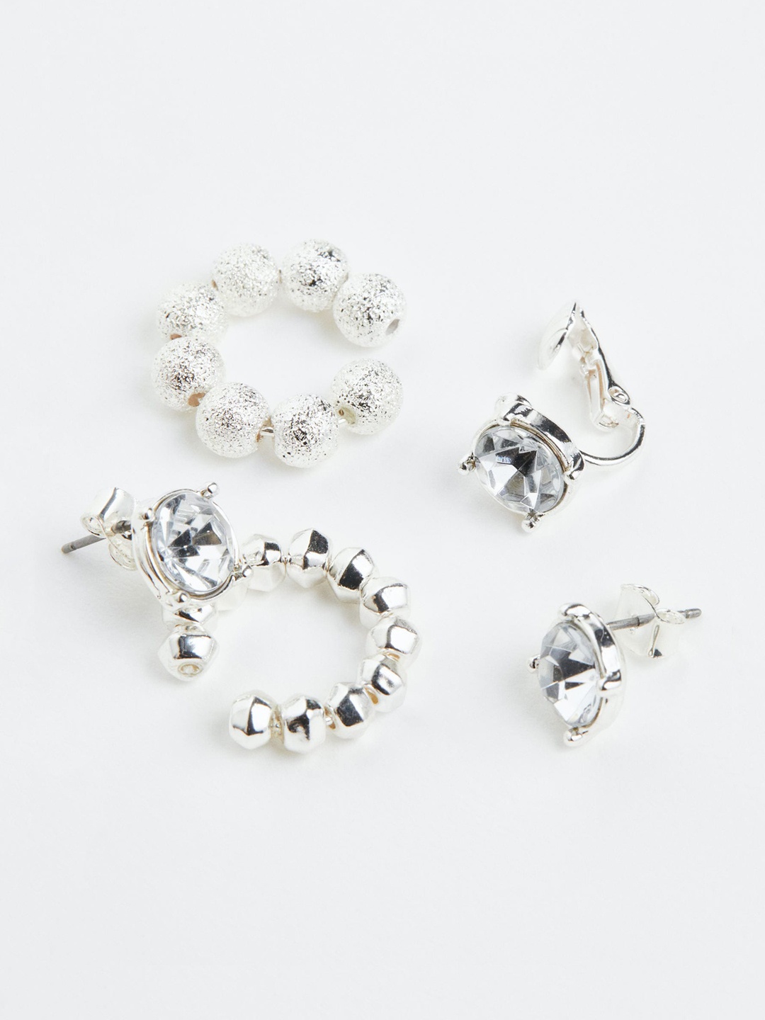 

H&M Women Silver Earrings and Ear Cuffs
