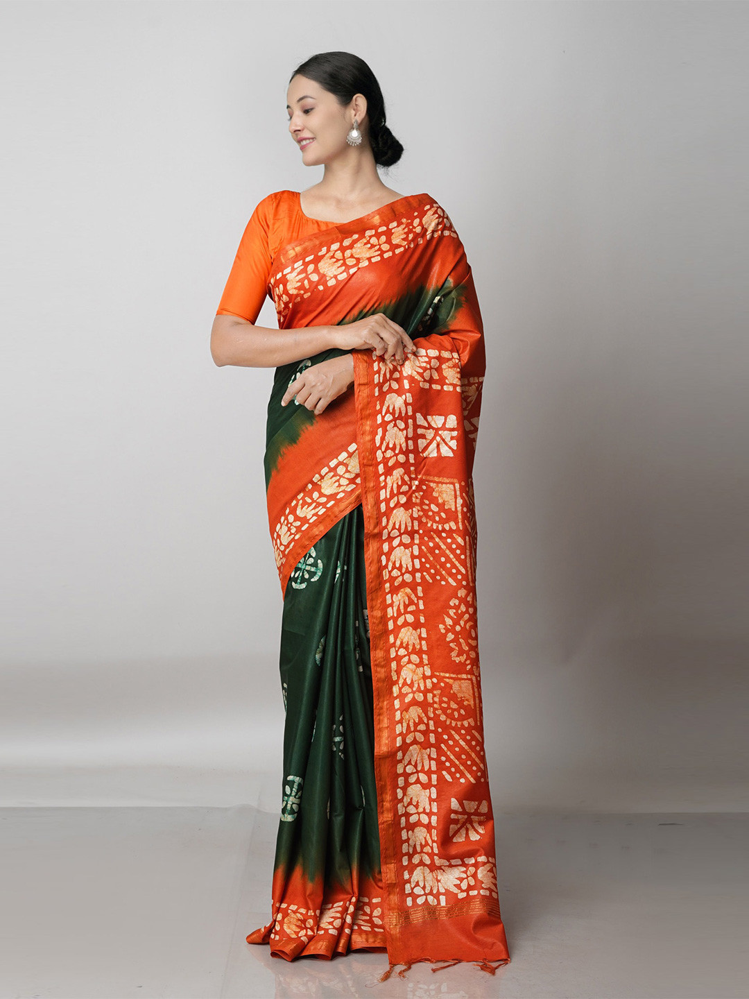

Unnati Silks Green & Orange Batik Zari Pure Silk Chanderi Saree