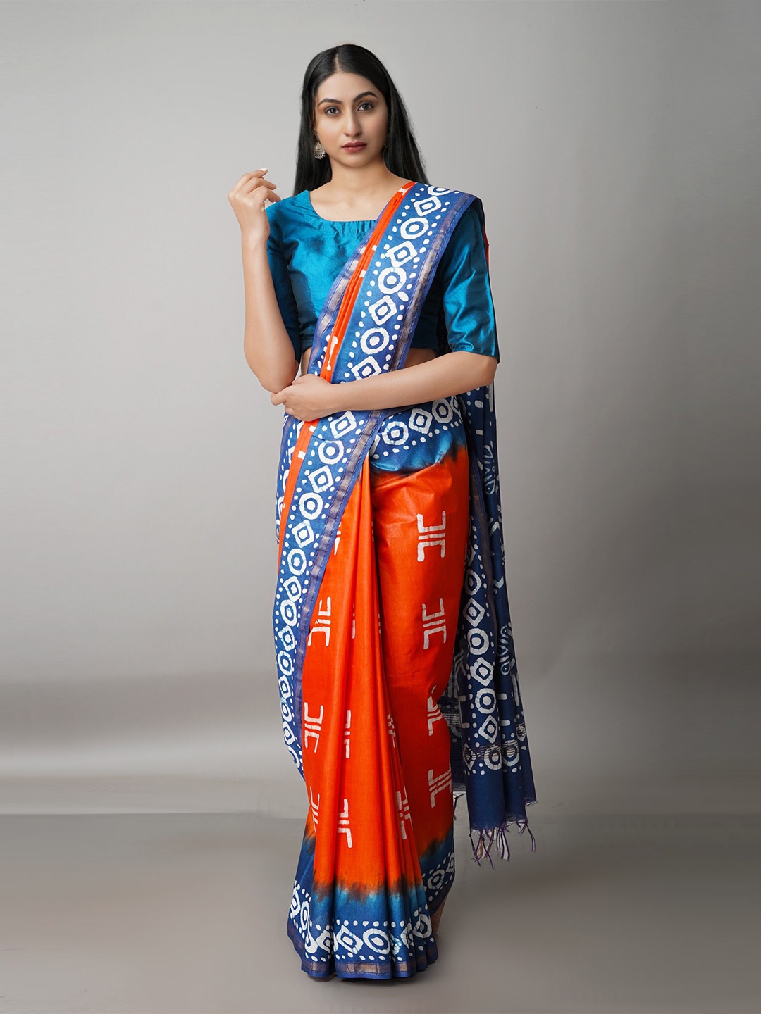 

Unnati Silks Orange & White Batik Zari Pure Silk Chanderi Saree