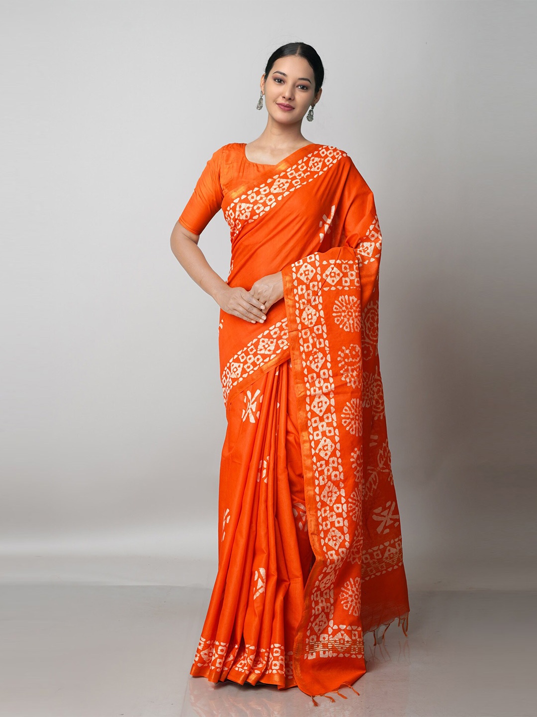 

Unnati Silks Orange & White Batik Zari Pure Silk Chanderi Saree