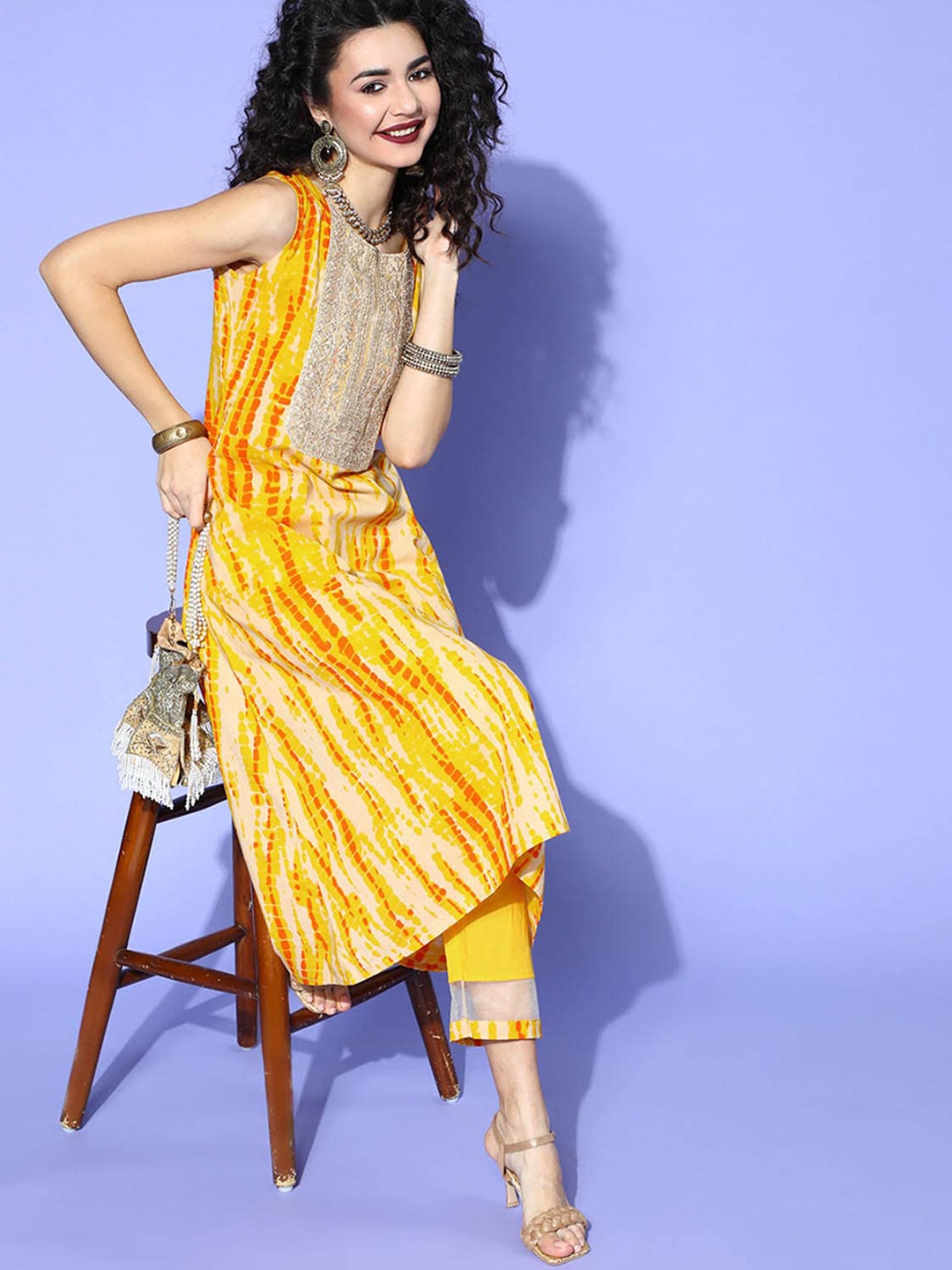 

ODETTE Women Yellow Printed Sequinned Kurta with Trousers
