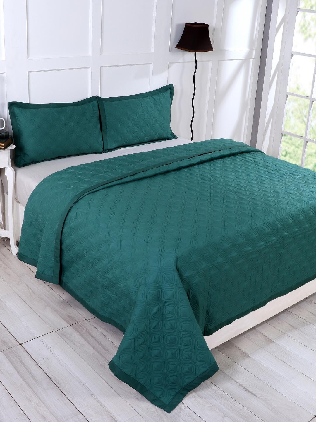 

A Homes Grace Green Embroidered & Quilted Bedcover