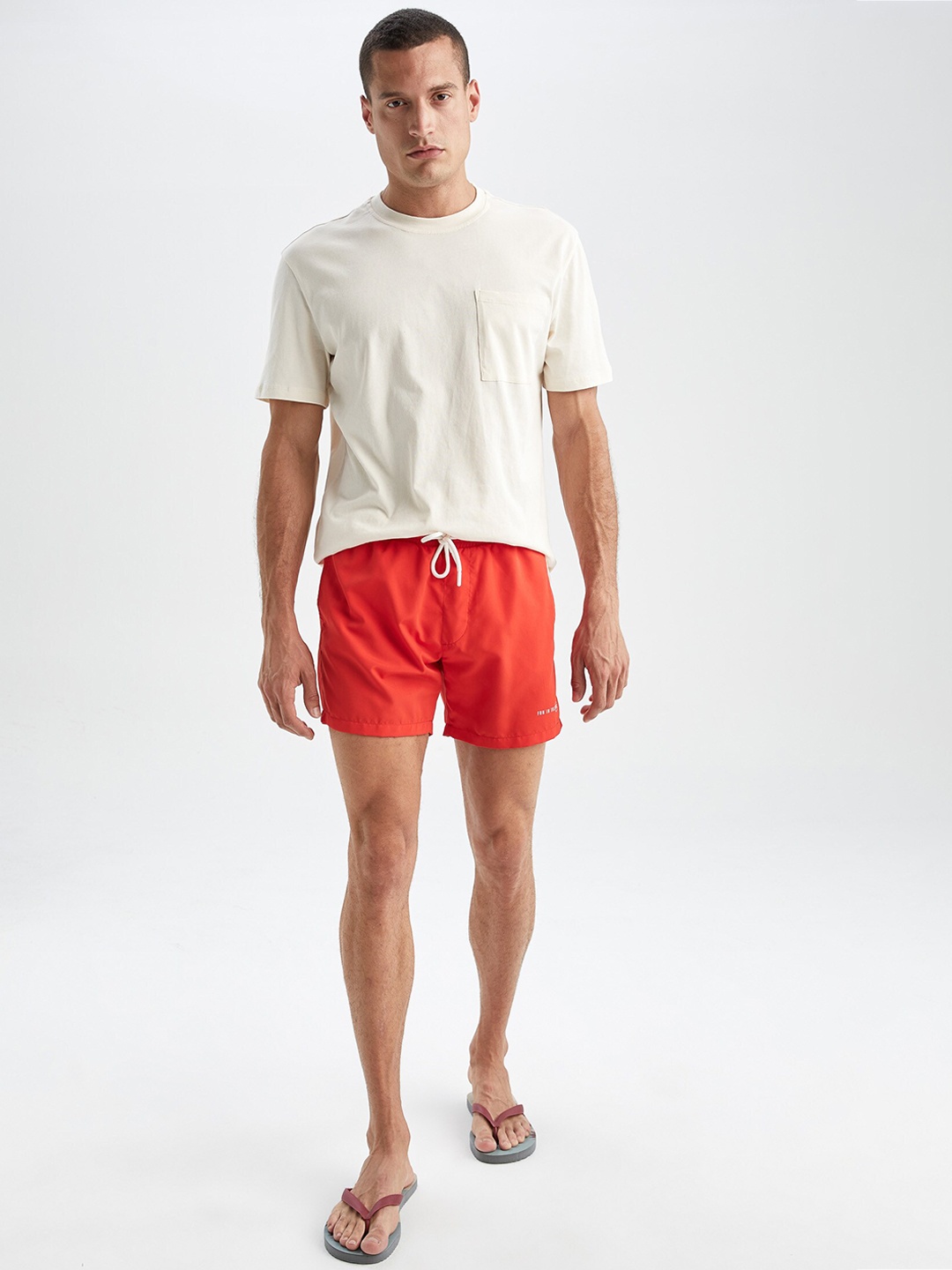 

DeFacto Men Red Solid Mid-Rise Swim Shorts