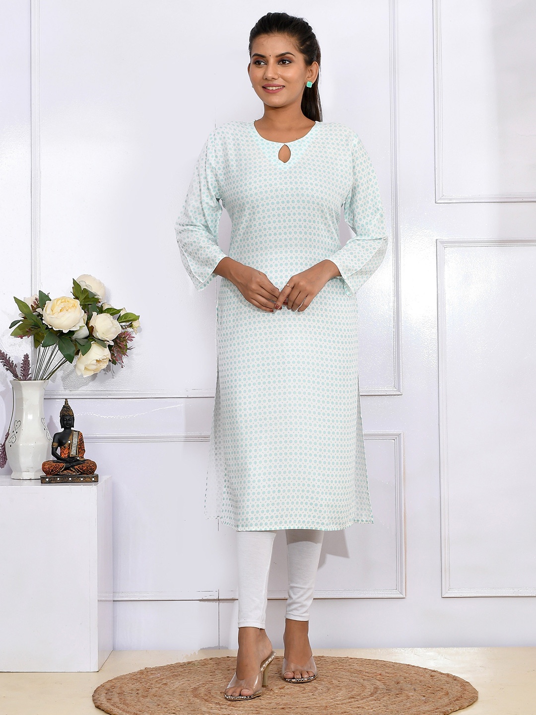 

Kesarya Women White & Blue Floral Printed Keyhole Neck Pure Cotton Kurta