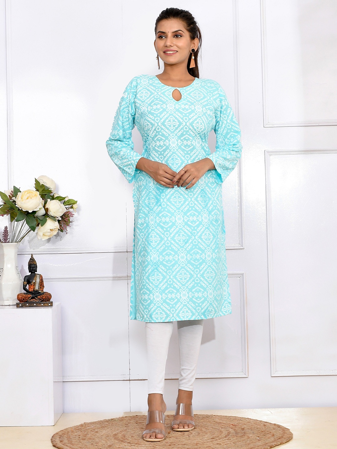 

Kesarya Turquoise Blue & White Ethnic Motifs Printed Keyhole Neck Cotton Kurta