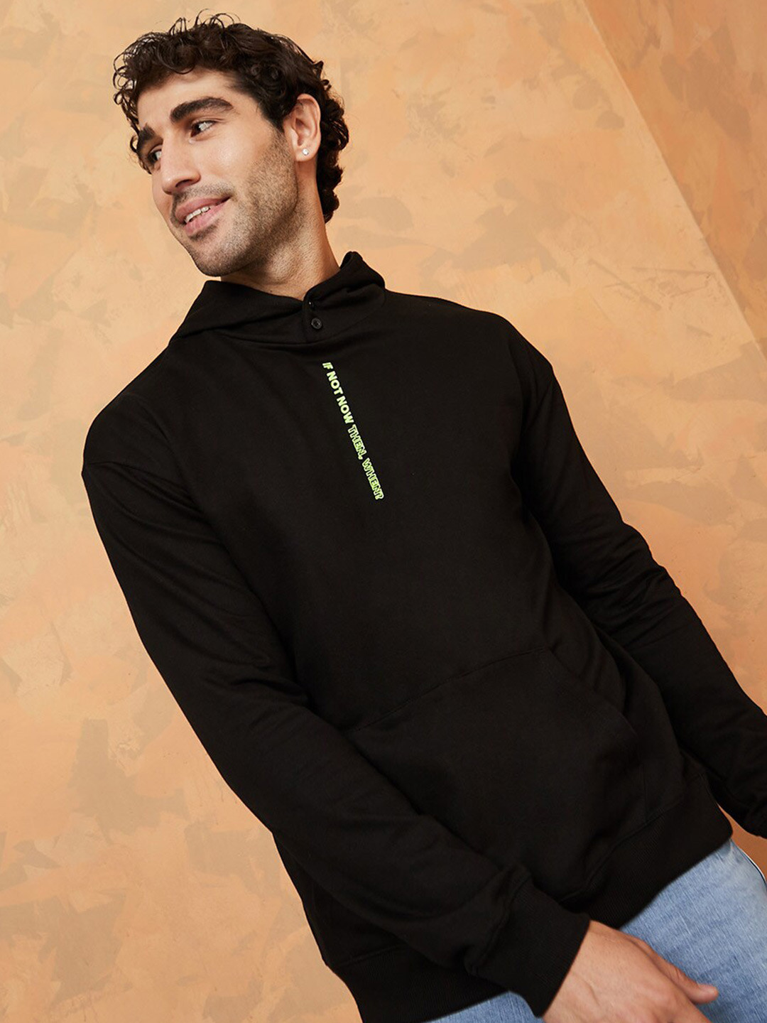

Styli Men Solid Knitted Hooded Sweatshirt with Minimal HD Typography Print Detail, Black