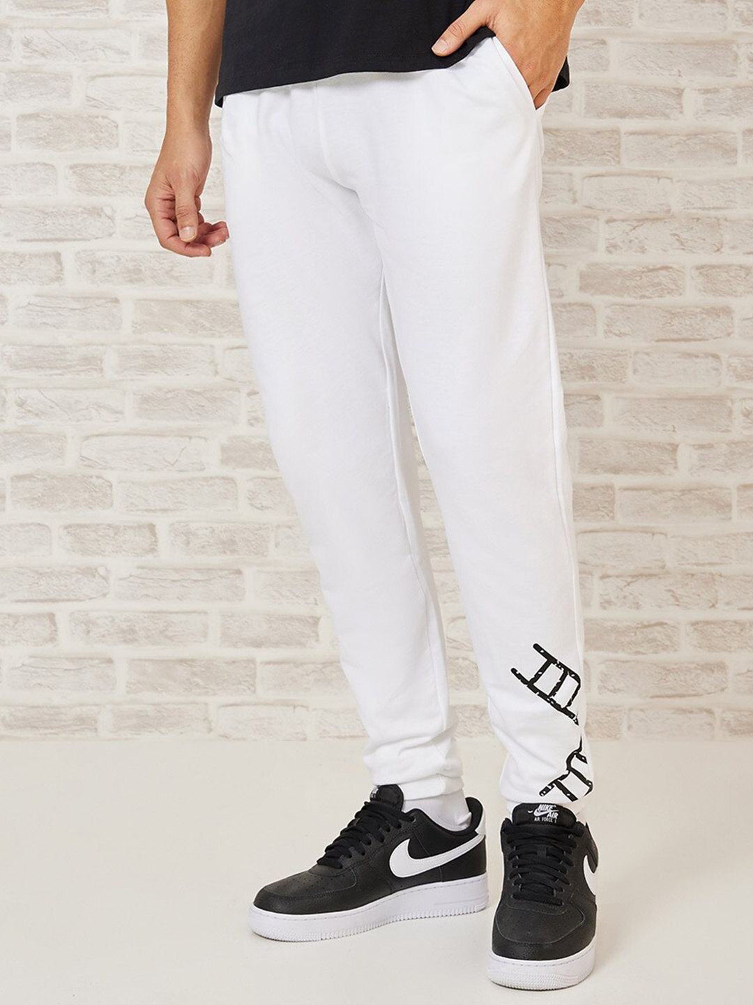 

Styli Men Slim Fit Joggers with Bottom Ladder Print, White