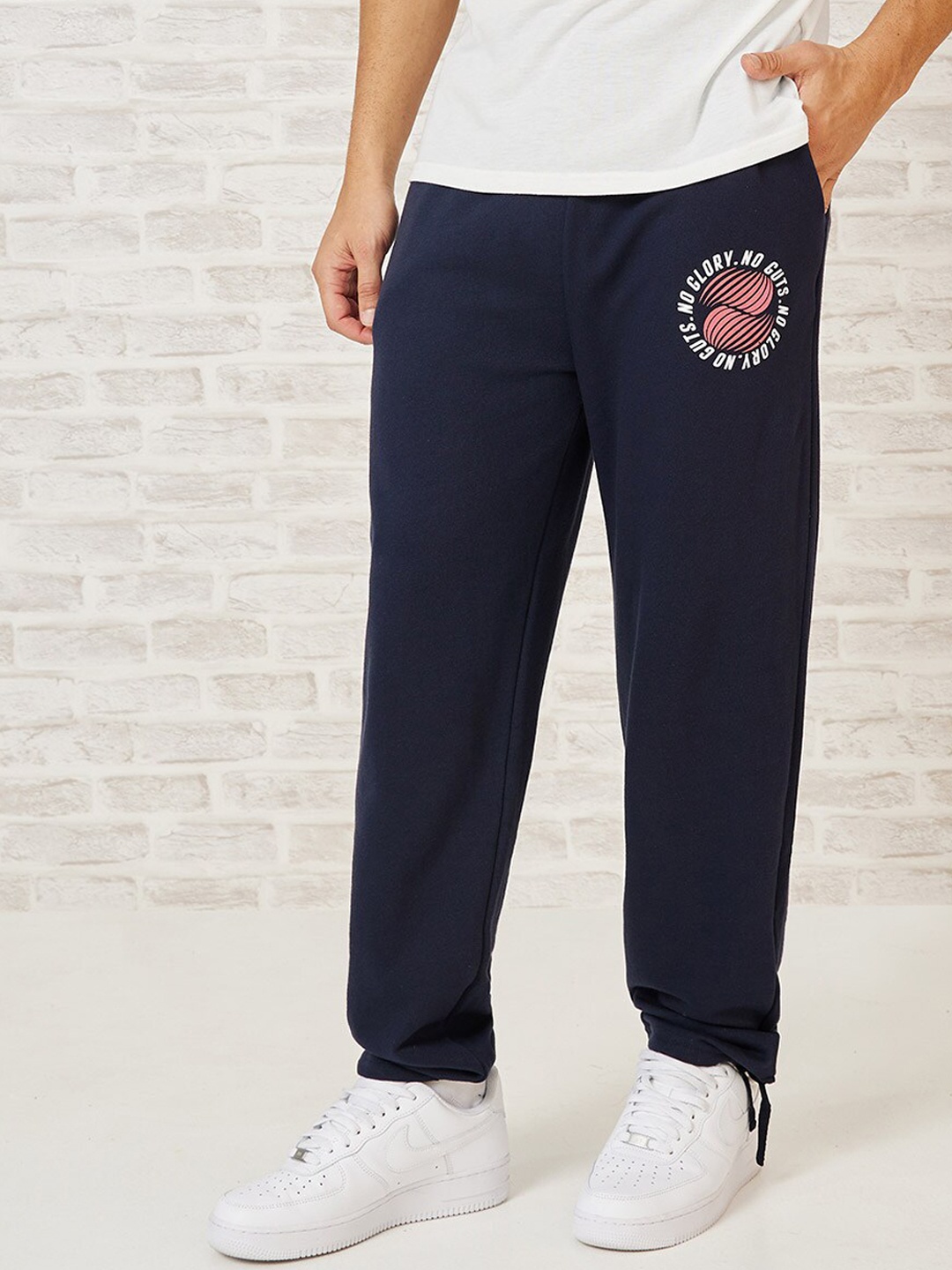 

Styli Men HD Printed Straight Fit Joggers With Tie Up Hem, Navy blue
